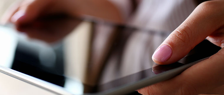 person using tablet